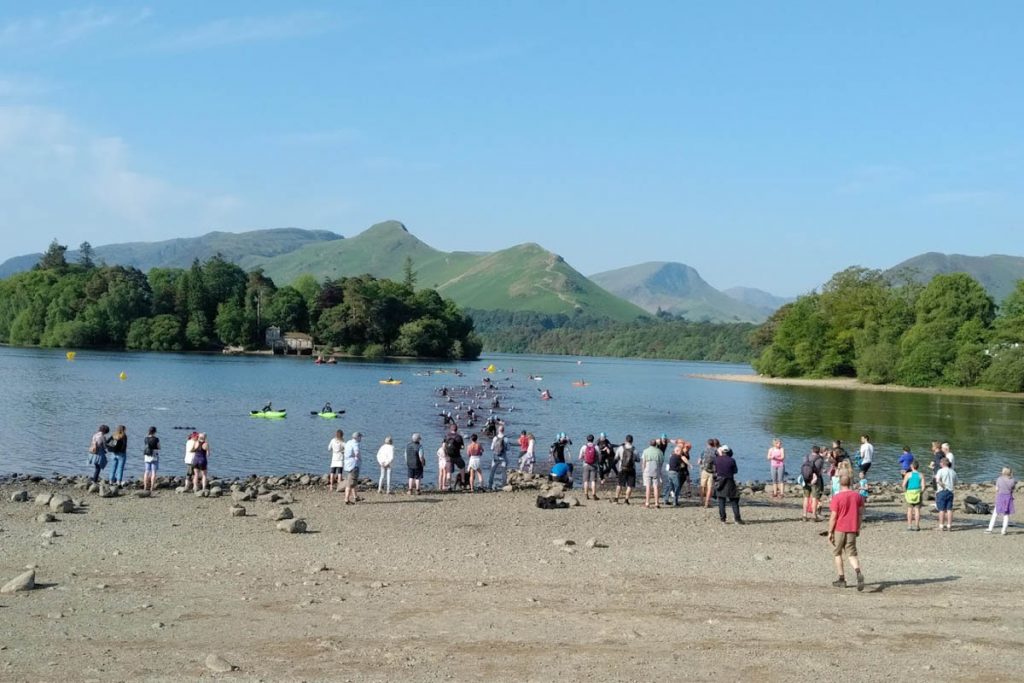 Triathlon leaving Derwentwater at Crow Park